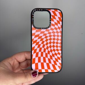 CASETiFY iPhone 16 Pro MagSafe Case Red Pink Checkerboard